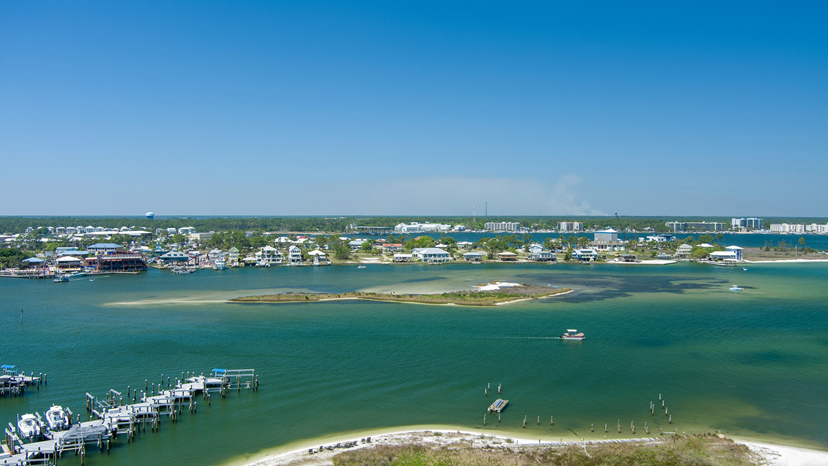 An aerial view of the water and surrounding city in Orange Beach in Baldwin County, Alabama.
