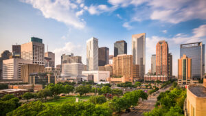 The skyline of the city of Houston, TX, as the sun starts to set.