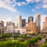 The skyline of the city of Houston, TX, as the sun starts to set.