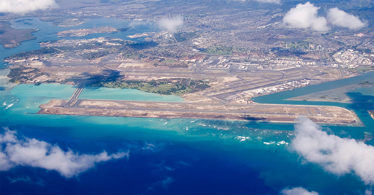 An aerial shot of HNL, Daniel K Inouye International Airport in Honolulu on Oahu Island, Hawaii.